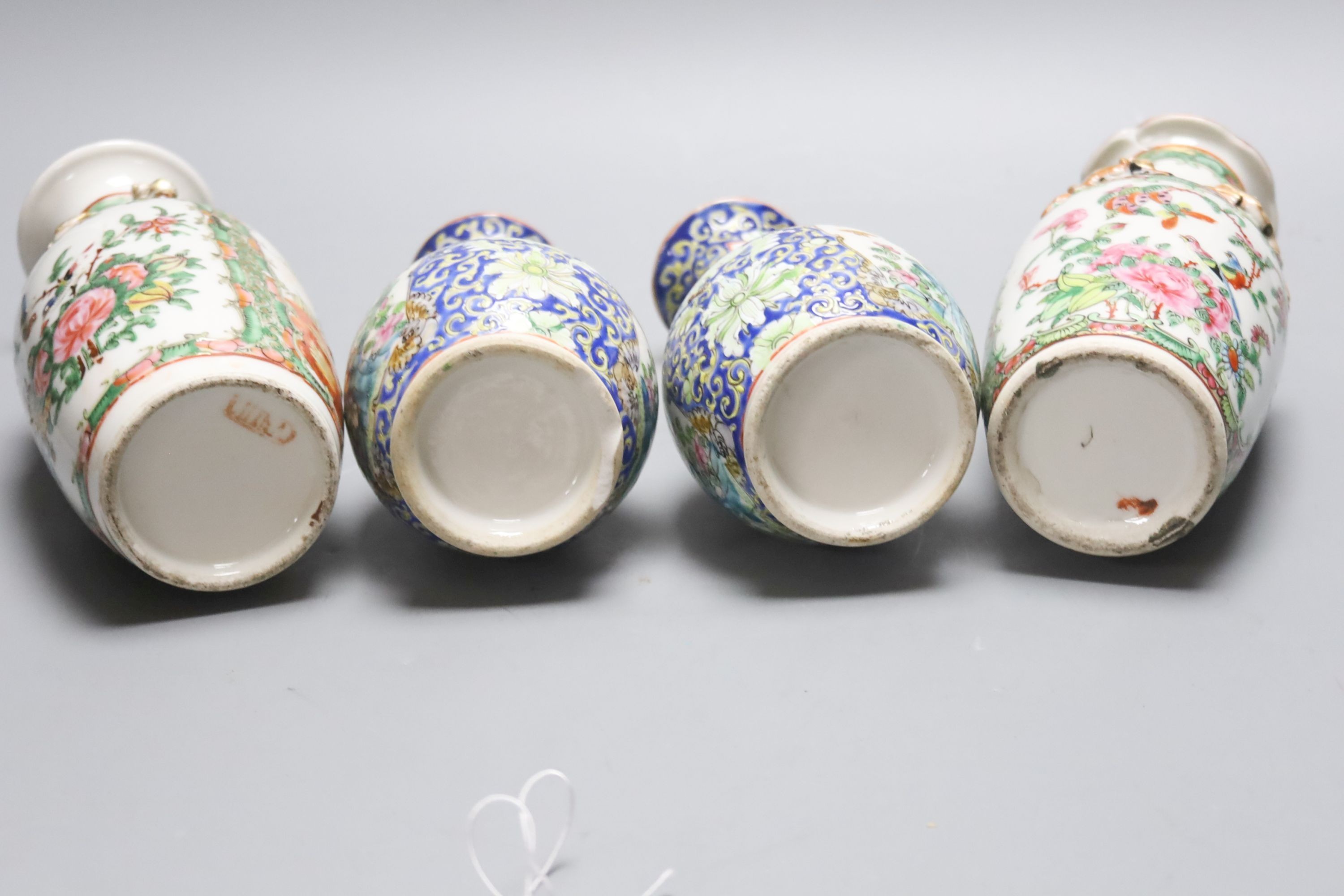 Four 19th century Chinese famille rose vases, 21cm